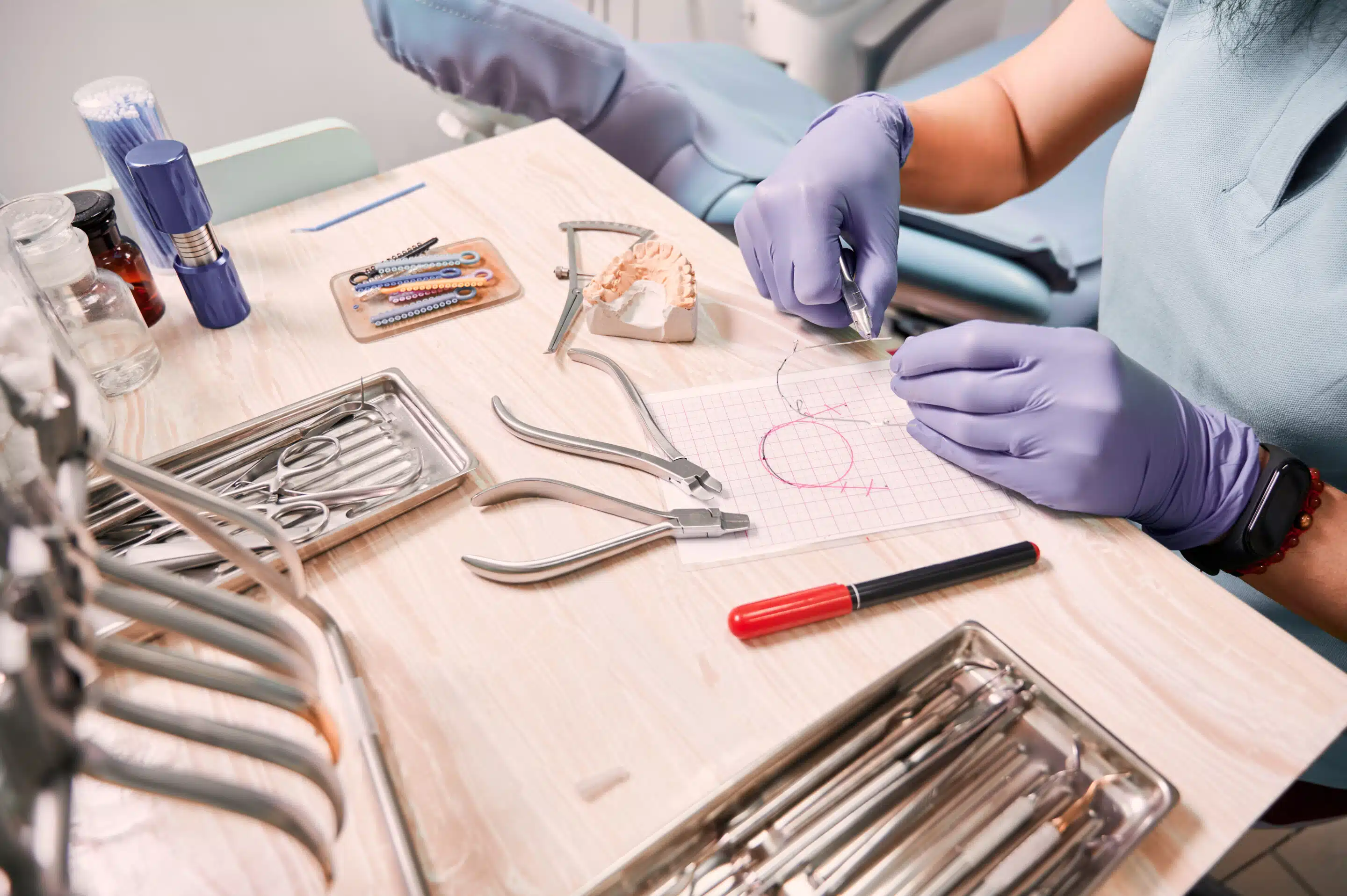 Female orthodontist working in dental office.